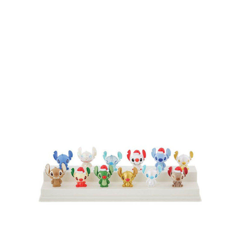 Figura mistery bag enesco grand jester disney mini stitch navideño 1 unidad aleatoria