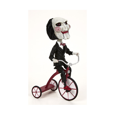 Figura neca saw head knocker puppet on tricyclesue)